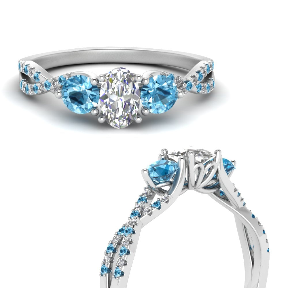 trellis-twisted-3-stone-oval-shaped-diamond-ring-blue-topaz-in-white-gold-FD123699OVRGICBLTOANGLE3-NL-WG_afcbaf40-ca2a-404d-9a8f-8c2d4d61e8f7?v=1756181876