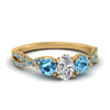 Load image into Gallery viewer, trellis-twisted-3-stone-oval-shaped-diamond-ring-blue-topaz-in-yellow-gold-FD123699OVRGICBLTO-NL-YG_a15dcdb7-6e37-41c2-b59b-aa2dc71f72b6?v=1756181876