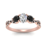 Load image into Gallery viewer, trellis-twisted-3-stone-oval-shaped-diamond-ring-with-black-diamond-in-rose-gold-FD123699OVRGBLACKANGLE5-NL-RG_726c5bc6-02e3-4a36-a377-23662f5ad7d8?v=1756181876
