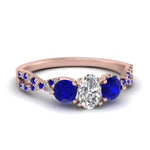 Load image into Gallery viewer, trellis-twisted-3-stone-oval-shaped-diamond-ring-with-sapphire-in-rose-gold-FD123699OVRGSABL-NL-RG_bf882f04-5be1-4dcb-b56d-3c3ce66ffce8?v=1756181877
