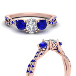 Load image into Gallery viewer, trellis-twisted-3-stone-oval-shaped-diamond-ring-with-sapphire-in-rose-gold-FD123699OVRGSABLANGLE3-NL-RG?v=1756181705
