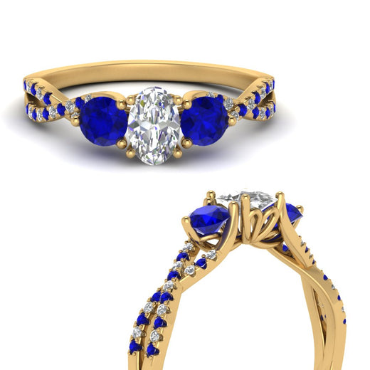 trellis-twisted-3-stone-oval-shaped-diamond-ring-with-sapphire-in-yellow-gold-FD123699OVRGSABLANGLE3-NL-YG?v=1756181705