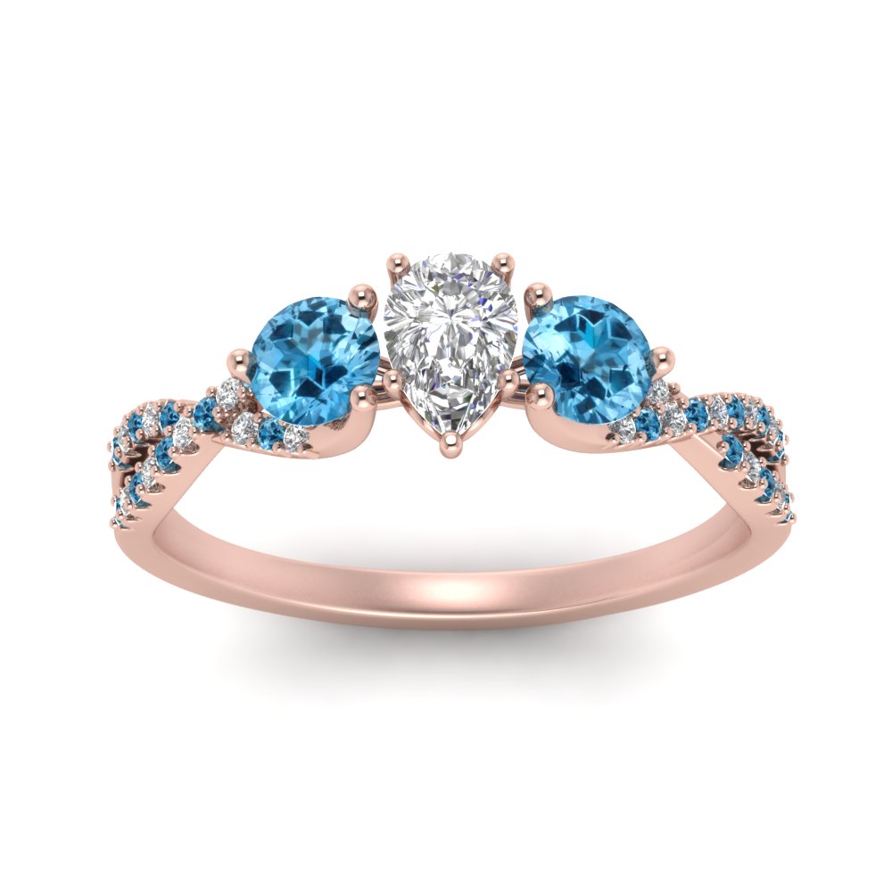 trellis-twisted-3-stone-pear-shaped-diamond-ring-blue-topaz-in-rose-gold-FD123699PERGICBLTOANGLE5-NL-RG_ecfa7f49-3e27-4545-b578-55db8523f4ef?v=1756181892