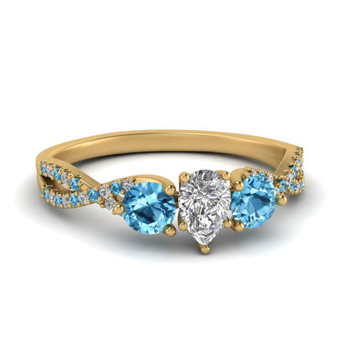 trellis-twisted-3-stone-pear-shaped-diamond-ring-blue-topaz-in-yellow-gold-FD123699PERGICBLTO-NL-YG?v=1756181726