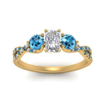 Load image into Gallery viewer, trellis-twisted-3-stone-radiant-cut-diamond-ring-blue-topaz-in-yellow-gold-FD123699RARGICBLTOANGLE5-NL-YG_9e27e9bc-60cd-4607-86aa-32d90924da8d?v=1756181919
