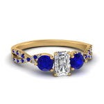Load image into Gallery viewer, trellis-twisted-3-stone-radiant-cut-diamond-ring-with-sapphire-in-yellow-gold-FD123699RARGSABL-NL-YG_f51aa0e4-3071-4d54-a34e-4cb28e97995c?v=1756181918
