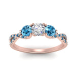 Load image into Gallery viewer, trellis-twisted-3-stone-round-cut-diamond-ring-blue-topaz-in-rose-gold-FD123699RORGICBLTOANGLE5-NL-RG?v=1756181788
