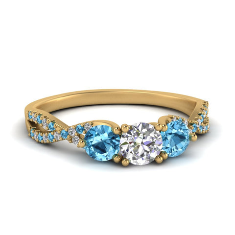 trellis-twisted-3-stone-round-cut-diamond-ring-blue-topaz-in-yellow-gold-FD123699RORGICBLTO-NL-YG_0e45ea6a-b394-476b-b104-38b66982fa22?v=1756181932