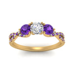 Load image into Gallery viewer, trellis-twisted-3-stone-round-cut-diamond-ring-violet-topaz-in-yellow-gold-FD123699RORGVITOANGLE5-NL-YG_d59d3560-dac2-45ba-bd3c-2ff8f86278b8?v=1756181932
