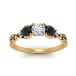 Load image into Gallery viewer, trellis-twisted-3-stone-round-cut-diamond-ring-with-black-diamond-in-yellow-gold-FD123699RORGBLACKANGLE5-NL-YG?v=1756181788
