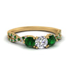Load image into Gallery viewer, trellis-twisted-3-stone-round-cut-diamond-ring-with-emerald-in-yellow-gold-FD123699RORGEMGR-NL-YG?v=1756181788