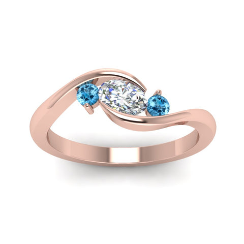 twist-3-stone-engagement-ring-with-blue-topaz-in-rose-gold-FD8896GICBLTOANGLE5-NL-RG