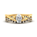 Load image into Gallery viewer, twisted-daisy-oval-black-diamond-bridal-ring-set-in-yellow-gold-FD9986B2OVGBLACK-NL-YG

