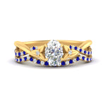 Load image into Gallery viewer, twisted-daisy-oval-sapphire-bridal-ring-set-in-yellow-gold-FD9986B2OVGSABL-NL-YG
