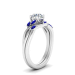 Load image into Gallery viewer, https://cdn.fascinatingdiamonds.com/FD8300/twisted-diamond-round-wedding-band-sets-with-sapphire-in-white-gold-FD8300-NL-WG

