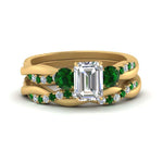 Load image into Gallery viewer, twisted-emerald-cut-diamond-wedding-band-with-emerald-in-yellow-gold-FDENS3301EMGEMGR-NL-YG.jpg
