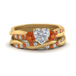 Load image into Gallery viewer, twisted-heart-diamond-wedding-band-with-orange-sapphire-in-yellow-gold-FDENS3301HTGSAOR-NL-YG.jpg
