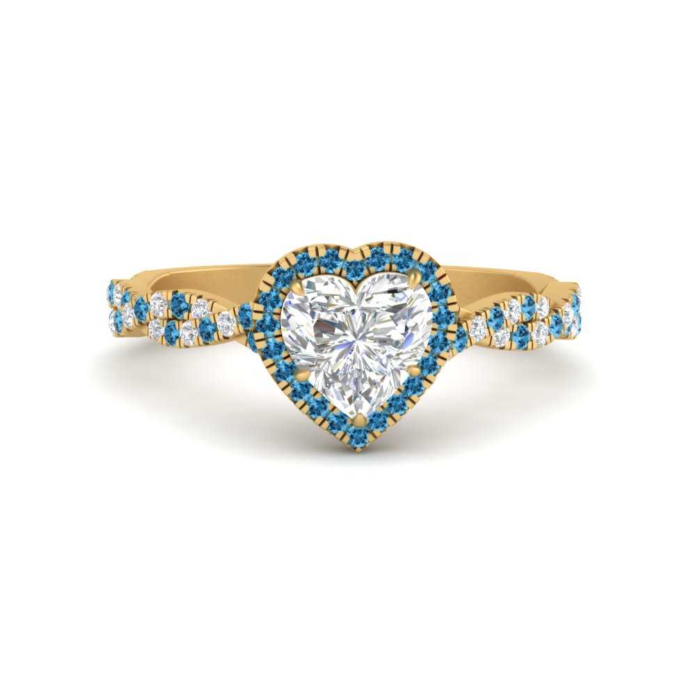 twisted-heart-shaped-blue-topaz-halo-engagement-ring-in-yellow-gold-FD9126HTRGICBLTO-NL-YG_31546498-4665-4706-92bc-493422f6b40b?v=1757924912