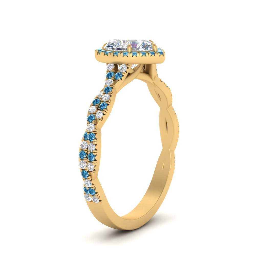 twisted-heart-shaped-blue-topaz-halo-engagement-ring-in-yellow-gold-FD9126HTRGICBLTOANGLE2-NL-YG_129717fb-4ad0-42f9-bbc9-ceef8092dbb7?v=1757924912