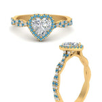 Load image into Gallery viewer, twisted-heart-shaped-blue-topaz-halo-engagement-ring-in-yellow-gold-FD9126HTRGICBLTOANGLE3-NL-YG_37dd57ff-cf5b-476e-8d25-0f2d2cfe990e?v=1757924912
