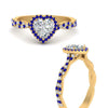 Load image into Gallery viewer, twisted-heart-shaped-sapphire-halo-engagement-ring-in-yellow-gold-FD9126HTRGSABLANGLE3-NL-YG_bcf07195-75a0-4ab0-927f-bffebebd100e?v=1757924911