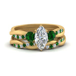 Load image into Gallery viewer, twisted-marquise-diamond-wedding-band-with-emerald-in-yellow-gold-FDENS3301MQGEMGR-NL-YG.jpg
