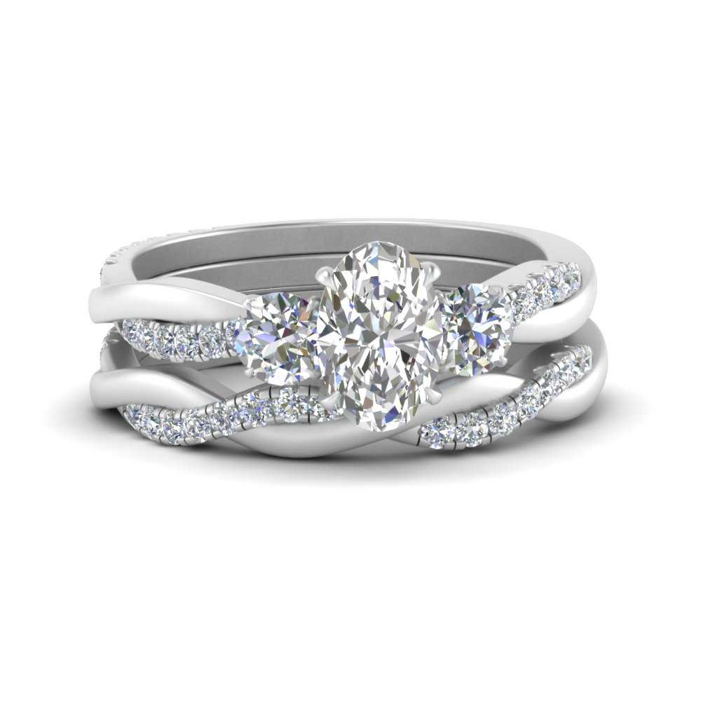 twisted-oval-shaped-diamond-wedding-band-in-white-gold-FDENS3301OV-NL-WG.jpg