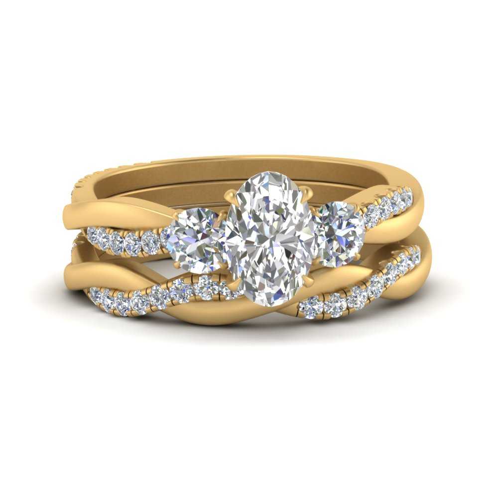 twisted-oval-shaped-diamond-wedding-band-in-yellow-gold-FDENS3301OV-NL-YG.jpg