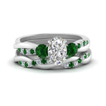 Load image into Gallery viewer, twisted-oval-shaped-diamond-wedding-band-with-emerald-in-white-gold-FDENS3301OVGEMGR-NL-WG.jpg
