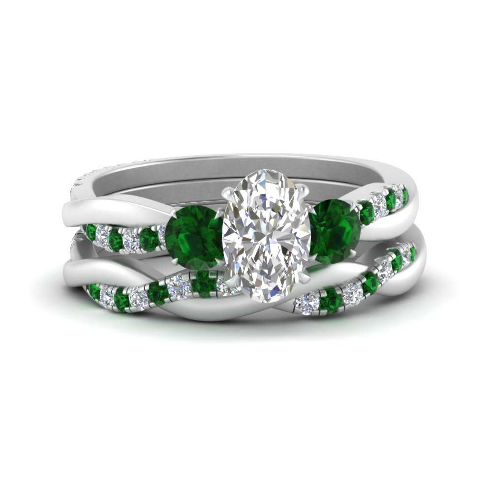 twisted-oval-shaped-diamond-wedding-band-with-emerald-in-white-gold-FDENS3301OVGEMGR-NL-WG.jpg