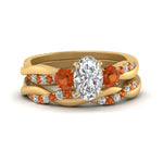 Load image into Gallery viewer, twisted-oval-shaped-diamond-wedding-band-with-orange-sapphire-in-yellow-gold-FDENS3301OVGSAOR-NL-YG.jpg
