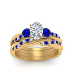 Load image into Gallery viewer, twisted-oval-shaped-diamond-wedding-band-with-sapphire-in-yellow-gold-FDENS3301OVGSABL-NL-YG.jpg
