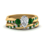 Load image into Gallery viewer, twisted-pear-shaped-diamond-wedding-band-with-emerald-in-yellow-gold-FDENS3301PEGEMGR-NL-YG.jpg
