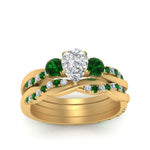 Load image into Gallery viewer, twisted-pear-shaped-diamond-wedding-band-with-emerald-in-yellow-gold-FDENS3301PEGEMGR-NL-YG.jpg
