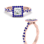 Load image into Gallery viewer, twisted-princess-cut-halo-diamond-engagement-ring-with-sapphire-in-rose-gold-FD9126PRRGSABLANGLE3-NL-RG_747f23e7-1633-49eb-bd92-35216088077c?v=1757924953

