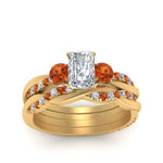 Load image into Gallery viewer, twisted-radiant-diamond-wedding-band-with-orange-sapphire-in-yellow-gold-FDENS3301RAGSAOR-NL-YG.jpg

