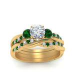 Load image into Gallery viewer, twisted-round-diamond-wedding-band-with-emerald-in-yellow-gold-FDENS3301ROGEMGR-NL-YG.jpg
