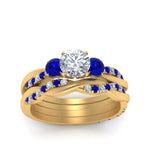 Load image into Gallery viewer, twisted-round-diamond-wedding-band-with-sapphire-in-yellow-gold-FDENS3301ROGSABL-NL-YG.jpg
