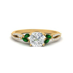 Load image into Gallery viewer, twisted-split-cushion-cut-vine-engagement-ring-with-emerald-in-yellow-gold-FDENR3211CURGEMGRANGLE3-NL-YG