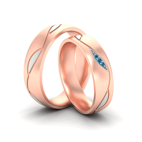 two-tone-couples-blue-topaz-wedding-ring-sets-in-rose-gold-fd9353bgicbltoangle2-nl-rg.jpg