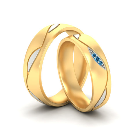 two-tone-couples-blue-topaz-wedding-ring-sets-in-yellow-gold-fd9353bgicbltoangle2-nl-yg.jpg
