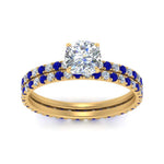 Load image into Gallery viewer, underhalo-eternity-cushion-cut-diamond-wedding-band-set-with-sapphire-in-FD9168CUGSABLANGLE3-NL-YG
