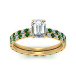 Load image into Gallery viewer, underhalo-eternity-emerald-cut-diamond-wedding-band-set-with-emerald-in-FD9168EMGEMGRANGLE3-NL-YG
