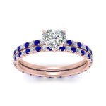 Load image into Gallery viewer, underhalo-eternity-heart-shaped-diamond-wedding-band-set-with-sapphire-in-FD9168HTGSABLANGLE3-NL-RG
