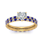 Load image into Gallery viewer, underhalo-eternity-heart-shaped-diamond-wedding-band-set-with-sapphire-in-FD9168HTGSABLANGLE3-NL-YG
