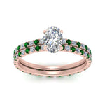 Load image into Gallery viewer, underhalo-eternity-oval-shaped-diamond-wedding-band-set-with-emerald-in-FD9168OVGEMGRANGLE3-NL-RG
