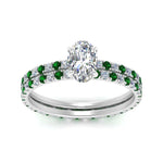 Load image into Gallery viewer, underhalo-eternity-oval-shaped-diamond-wedding-band-set-with-emerald-in-FD9168OVGEMGRANGLE3-NL-WG

