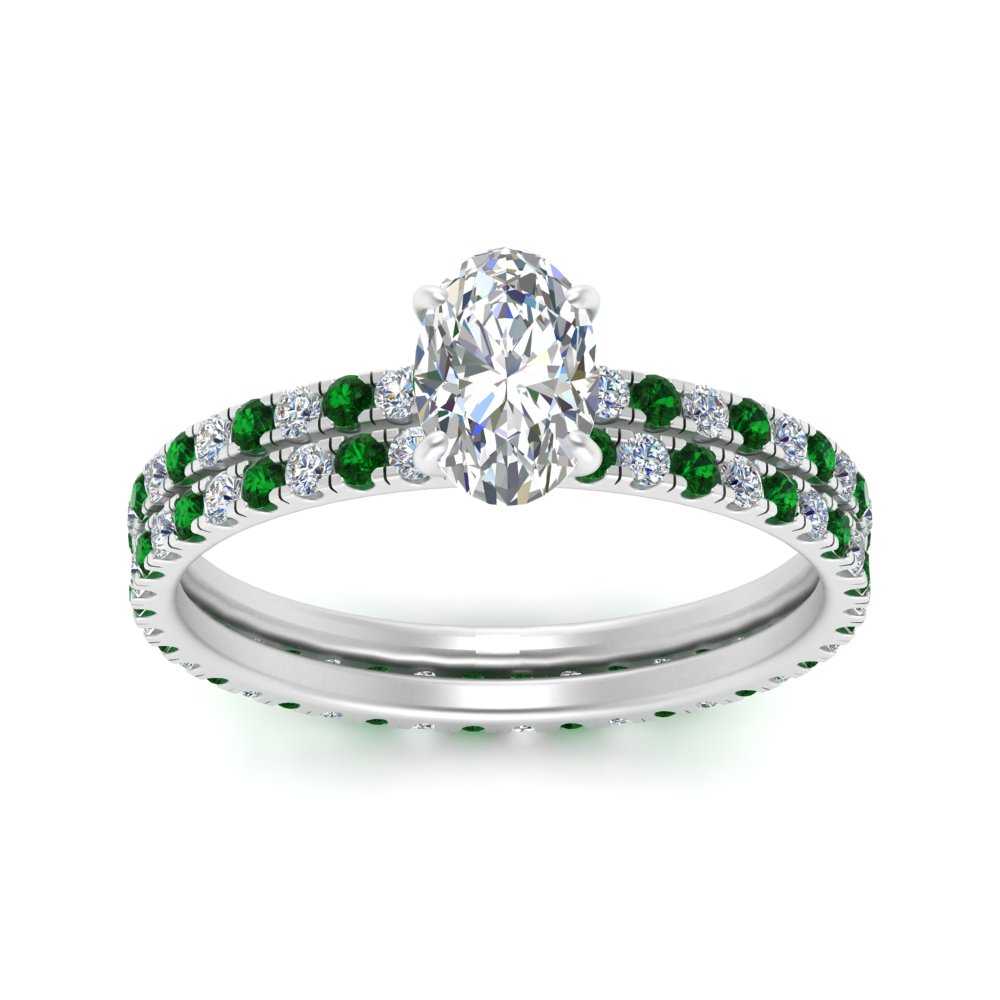 underhalo-eternity-oval-shaped-diamond-wedding-band-set-with-emerald-in-FD9168OVGEMGRANGLE3-NL-WG