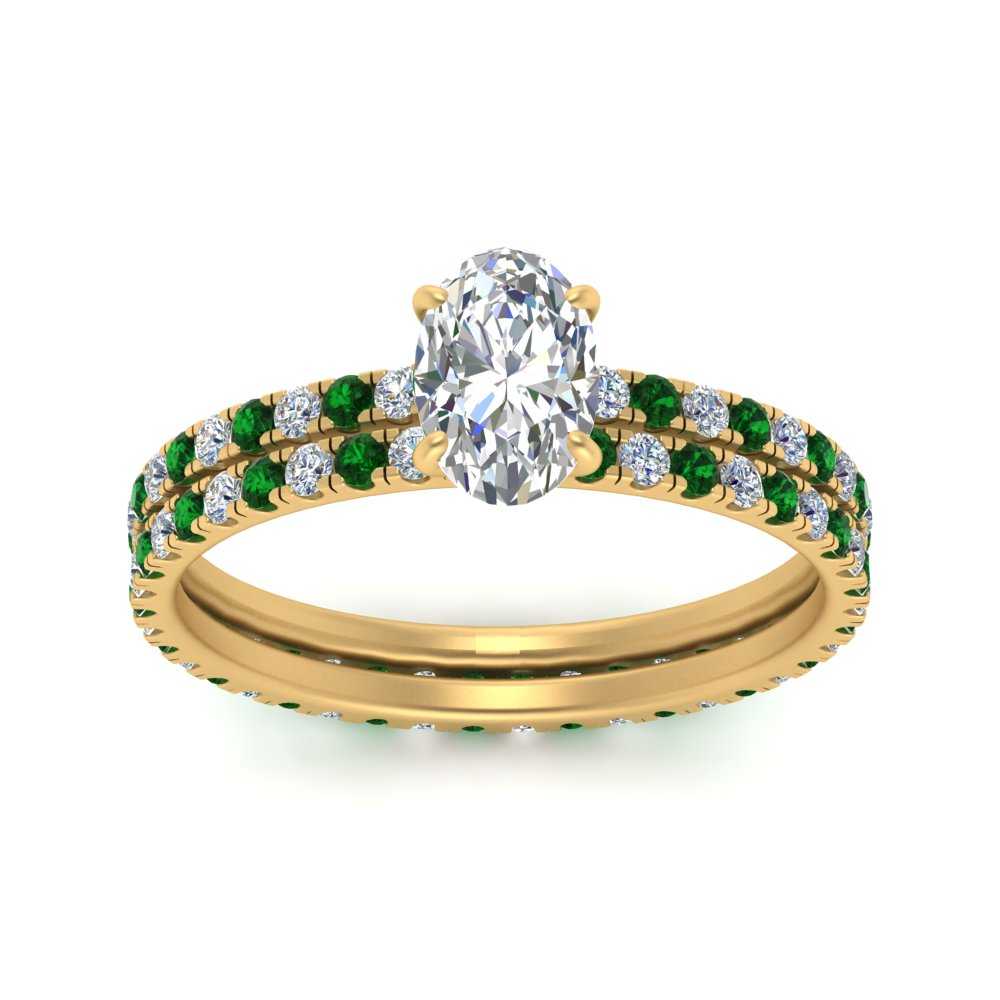 underhalo-eternity-oval-shaped-diamond-wedding-band-set-with-emerald-in-FD9168OVGEMGRANGLE3-NL-YG