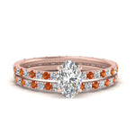 Load image into Gallery viewer, underhalo-eternity-oval-shaped-diamond-wedding-band-set-with-orange-sapphire-in-FD9168OVGSAORANGLE3-NL-RG
